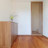 注文住宅 かっこいい工務店 岡山 アイム・コラボレーション アイムの家 施工例23 平屋のような佇まいの二世帯住宅 玄関ホール